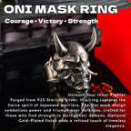 a silver Oni mask ring with a dragon-like design, set against a red background. The text above the image reads "ONI MASK RING Courage Victory Strength".